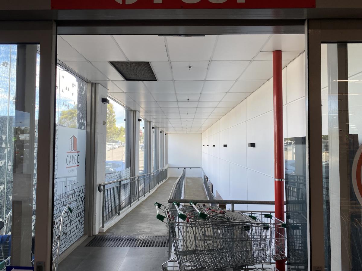 Large Path to Purchase sign near Woolworths
